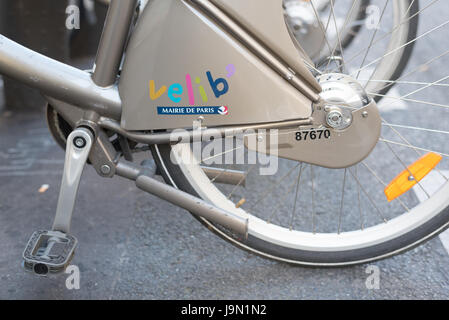 Paris, France May 25, 2017:  Closeup of Paris Vélib handlebars rental bike:  Closeup of grey velib  public bicycle rental wheel Stock Photo