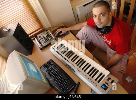 Musician/Rapper with keyboard and computer Stock Photo - Alamy