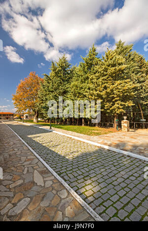 Cobbled path in the Greek Orthodox convent of Panagia Portaitissa in Soufli, Evros region, Thrace, Greece. Stock Photo
