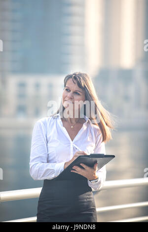 Professional business woman taking notes. Stock Photo