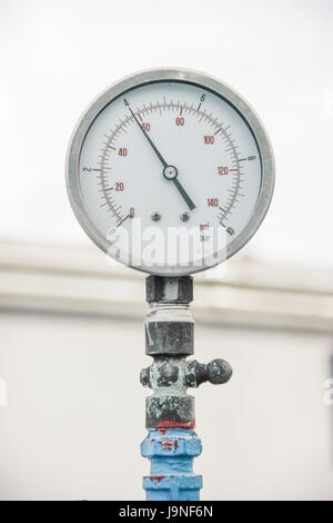 retro gauge, old meter water pipe on white background Stock Photo
