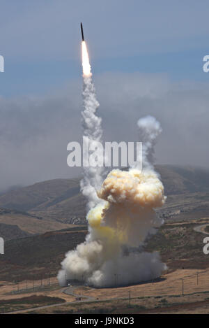 A Ground-based missile Interceptor is launched by the US Air Force 30th Space Wing May 30, 2017 from Vandenberg Air Force Base, California. The rocket successfully intercepted an intercontinental ballistic missile target and its exo-atmospheric kill vehicle intercepted and destroyed the target in a direct collision. The test coincides with recent ICBM development by North Korea which potentially threatens the United States. Stock Photo