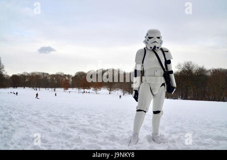 a man dressed as a star wars stormtrooper in the snow at prospect park brooklyn USA Stock Photo