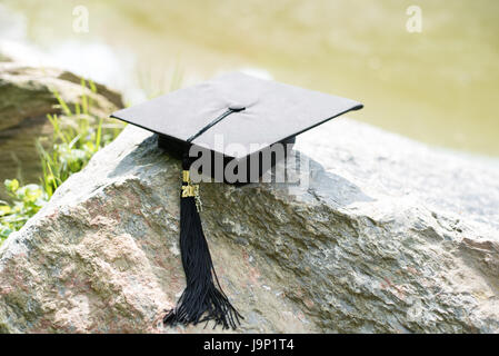 Graduation Hat Rocks Graduation Cap on Rock Stock Photo - Alamy