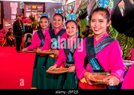 Gathering of indigenous kadazandusan groups on last day of Pesta Kaamatan or harvest festival at Hogkod Koisaan KDCA in Kota Kinabalu Sabah Malaysia Stock Photo