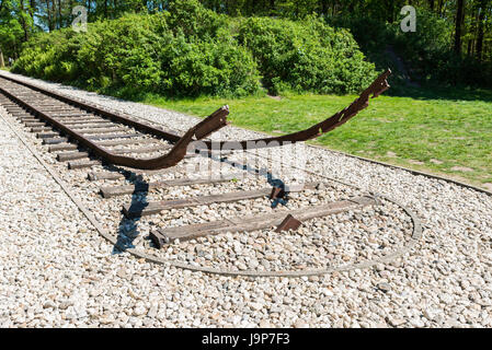 end of the railroad track as monument in the westerbork transition camp from second world war Stock Photo