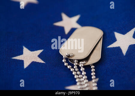Full frame of dog tag on an American flag Stock Photo