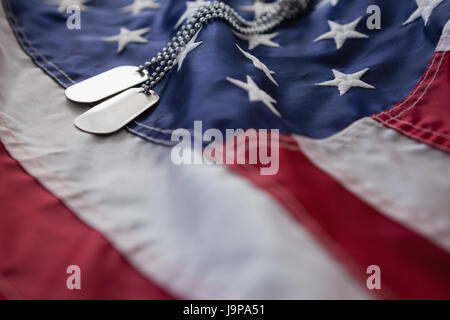 Full frame of dog tag on an American flag Stock Photo
