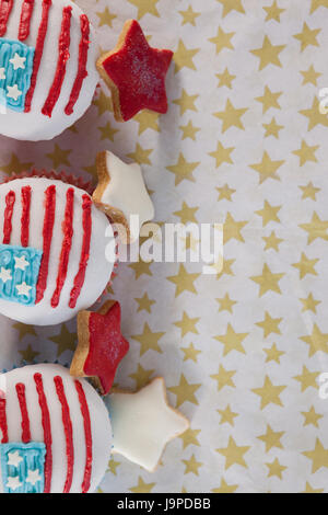 Close-up of decorated cupcakes arranged on table Stock Photo