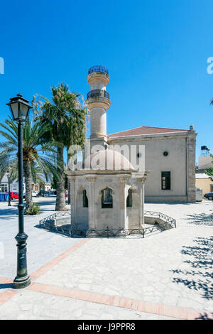 Turkish mosque and old fountain in the town of Lerapetra, Ierapetra, on the Greek island of Crete Stock Photo