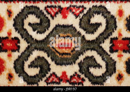 geometric  pattern old Persian carpet closeup Stock Photo