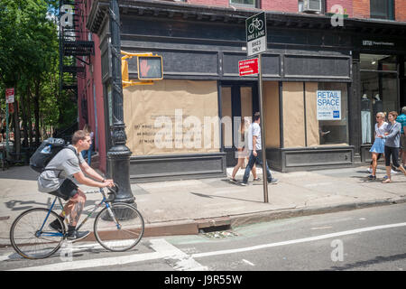 The closed Ralph Lauren store on trendy Bleecker Street in the Greenwich Village neighborhood of New York is seen on Thursday, June 1, 2017. As leases expire rents are becoming untenable even for luxury retailers who used the spaces as museum stores.   (© Richard B. Levine) Stock Photo