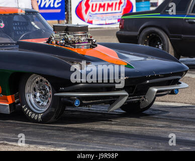 A corvette in action at the Redding Drag Strip. Stock Photo