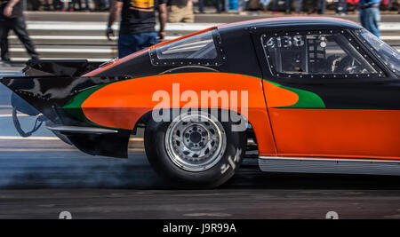 A corvette in action at the Redding Drag Strip. Stock Photo