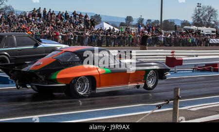 A corvette in action at the Redding Drag Strip. Stock Photo