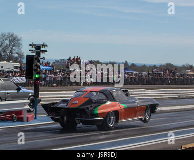 A corvette in action at the Redding Drag Strip. Stock Photo