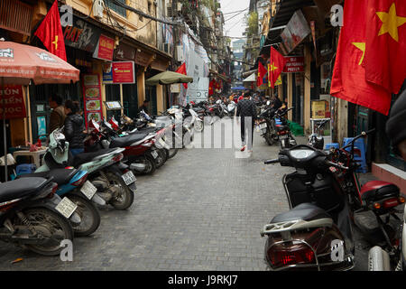 Motorcycles parked in alley, Old Quarter, Hanoi, Vietnam Stock Photo
