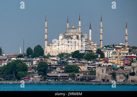 The Sultan Ahmed Mosque is a historic mosque located in Istanbul, Turkey. Also known as the Blue Mosque. Pictured from the Sea of Marmara. Stock Photo