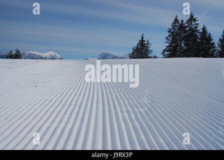 Snow surface,tracks,snow,rolled,structure,sample,grooves,winter,trees,mountains,mountain peaks,heavens, Stock Photo