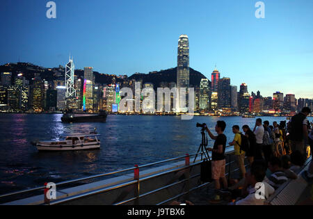 Hong Kong, China. 5th July, 2023. Buildings, skyscrapers and a screen ...