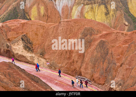 Zhangye, China's Gansu Province. 3rd June, 2017. Tourists visit the Danxia National Geological Park in Zhangye City, northwest China's Gansu Province, June 3, 2017. Credit: Wang Jiang/Xinhua/Alamy Live News Stock Photo