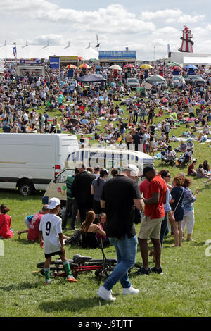 Epsom Downs, Surrey, UK. 3rd June, 2017. Colourful scenes on Derby Day at Epsom Downs in Surrey, where the masses enjoy a picnic and a drink inside the racecourse. Credit: Julia Gavin UK/Alamy Live News Stock Photo