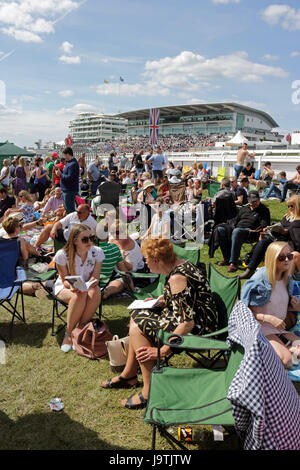 Epsom Downs, Surrey, UK. 3rd June, 2017. Colourful scenes on Derby Day at Epsom Downs in Surrey, where the masses enjoy a picnic and a drink beside the racecourse. Credit: Julia Gavin UK/Alamy Live News Stock Photo