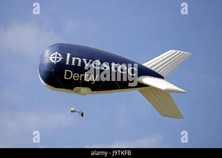 Epsom Downs, Surrey, UK. 3rd June 2017. The Investec blimp tethered over the racecourse on Derby Day at Epsom Downs in Surrey. Stock Photo