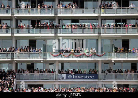 Epsom Downs, Surrey, UK. 3rd June 2017. The Queen dressed in yellow looks out across the downs from the royal balcony, on Derby Day at Epsom Downs in Surrey. Stock Photo