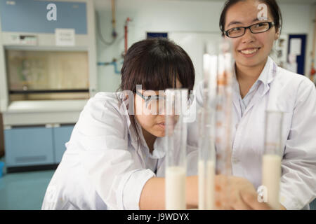 Bangkok, Thailand - November 22, 2012 : In a college in Bangkok, students study chemistry and science in the university's laboratory Stock Photo