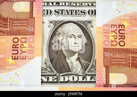 George Washington portrait on US one dollar bill with10 Eurospaper currency bank notes Stock Photo