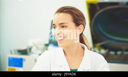 Woman with alb in lab, teacher, scientist Stock Photo