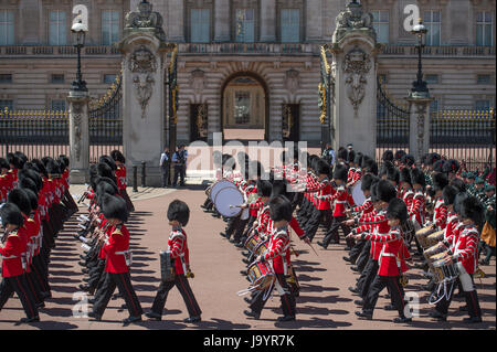 3rd June 2017. Massed Guards Bands march past open gates of Buckingham Palace at end of the Major General’s Review rehearsal for QBP. Stock Photo