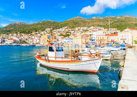 Typical fishing boat in Vathy port on beautiful summer day, Samos island, Greece Stock Photo