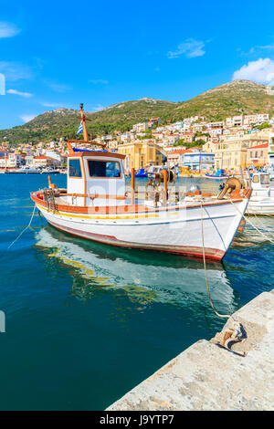 Typical fishing boat in Vathy port on beautiful summer day, Samos island, Greece Stock Photo