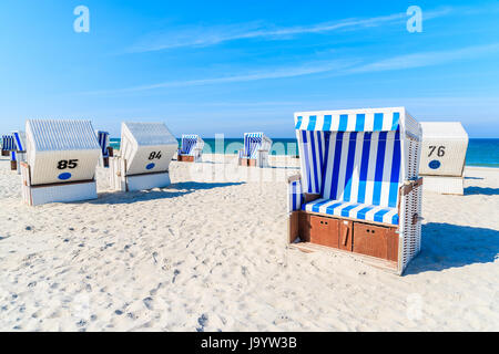 Wicker chairs on white sand Kampen beach, Sylt island, North Sea, Germany Stock Photo