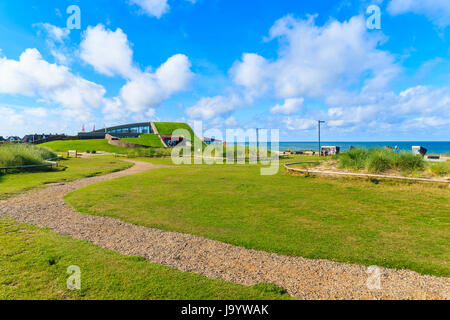 SYLT ISLAND, GERMANY - SEP 11, 2016: Path in green park in Wenningstedt seaside village on Sylt island, North Sea, Germany. Stock Photo