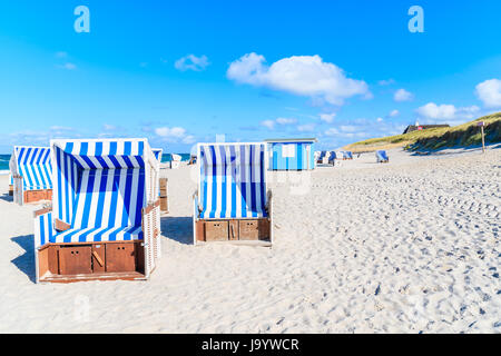 Wicker chairs on sandy beach in Kampen village on Sylt island, North Sea, Germany Stock Photo