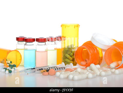 Five vials of medication exaggerated psychedelic with bright color of fluid. Three syringes with drugs and pill bottles spilled on reflective surface, Stock Photo