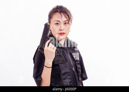 Chinese female police officer with handgun Stock Photo - Alamy