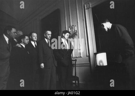 President John F. Kennedy watches the launch of the Mercury spacecraft carrying John H. Glenn, Jr. on television with, from left to right, Rep. Hale Boggs; Speaker of the House John McCormack; Rep. Carl Albert; Sen. Hubert Humphrey and Vice-President Lyndon B. Johnson. At extreme right is Sen. Mike Mansfield, Washington, DC, 02/20/1962. Stock Photo