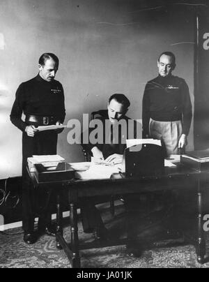 Sir Oswald Mosley (center), leader of the British Union of Fascists, with two chief staff officers, London, England, 1933. Stock Photo