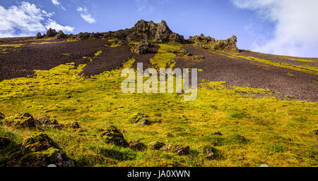 Volcanic rock formations in Reykjadalur Valley in South Iceland Stock Photo