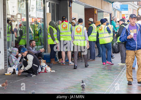 Northampton, Abington St, 4th June 2017. Volunteers from across the Muslim communities in Northampton share food with the homeless, bringing together between 60 and 70 homeless people from around the town to share some of the specially prepared food between 6pm and 7pm, the food which is made to break their daily fast in the evening, this happens every Sunday throughout Ramadan after their daily fasting has stopped. Credit: Keith J Smith./Alamy Live News Stock Photo