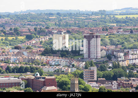 Bristol, England, UK - July 17, 2016: Council estate tower blocks rise above the terraced streets of south Bristol, with the Mendip Hills of North Som Stock Photo