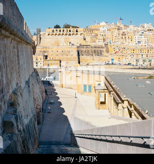 Valletta city walls as seen from Birgu (Vittoriosa) with bastioned Fort Saint Angelo in the foreground, Malta Stock Photo
