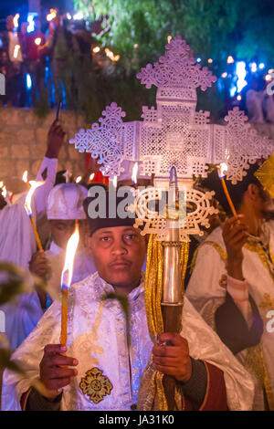 Ethiopian Orthodox pilgrims participates in the Holy fire ceremony at the Ethiopian section of the Holy Sepulcher in Jerusalem Israel Stock Photo