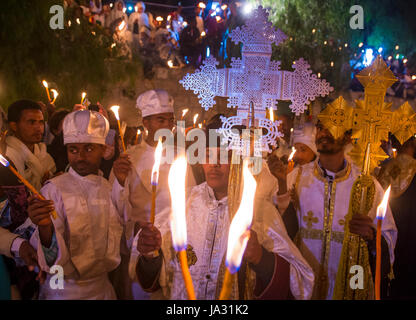 Ethiopian Orthodox pilgrims participates in the Holy fire ceremony at the Ethiopian section of the Holy Sepulcher in Jerusalem Israel Stock Photo