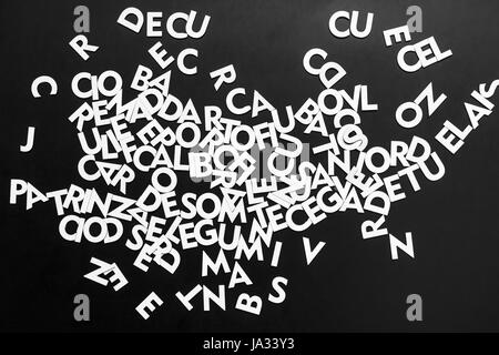 White Alphabet Letters On Blackboard Stock Photo