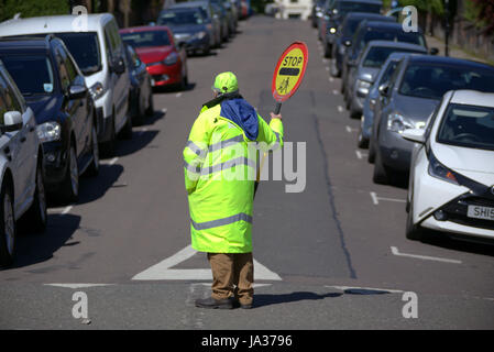 lollipop man road west end Glasgow school crossing Stock Photo